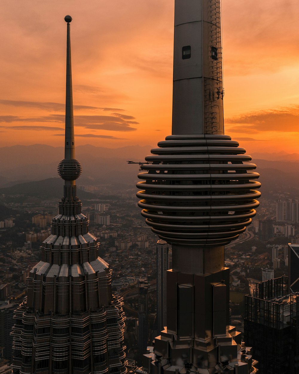 white and black tower during sunset