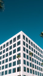 white concrete building under blue sky during daytime