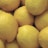A close-up view of fresh organic lemons in a basket.