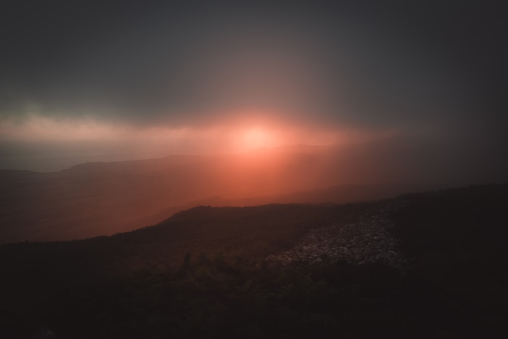 silhouette of mountain during sunset