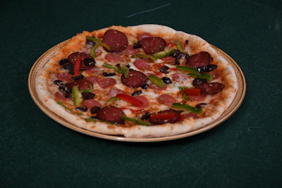 A variety of specialty pizzas with toppings like pepperoni, veggies, and cheese.