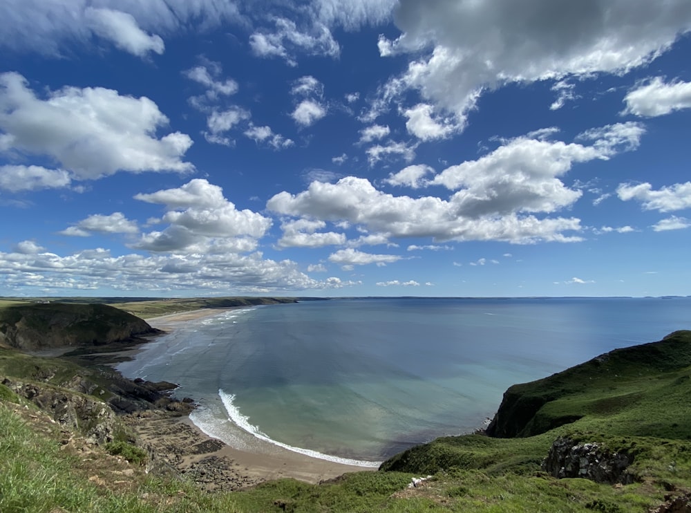 a view of the ocean from a hill