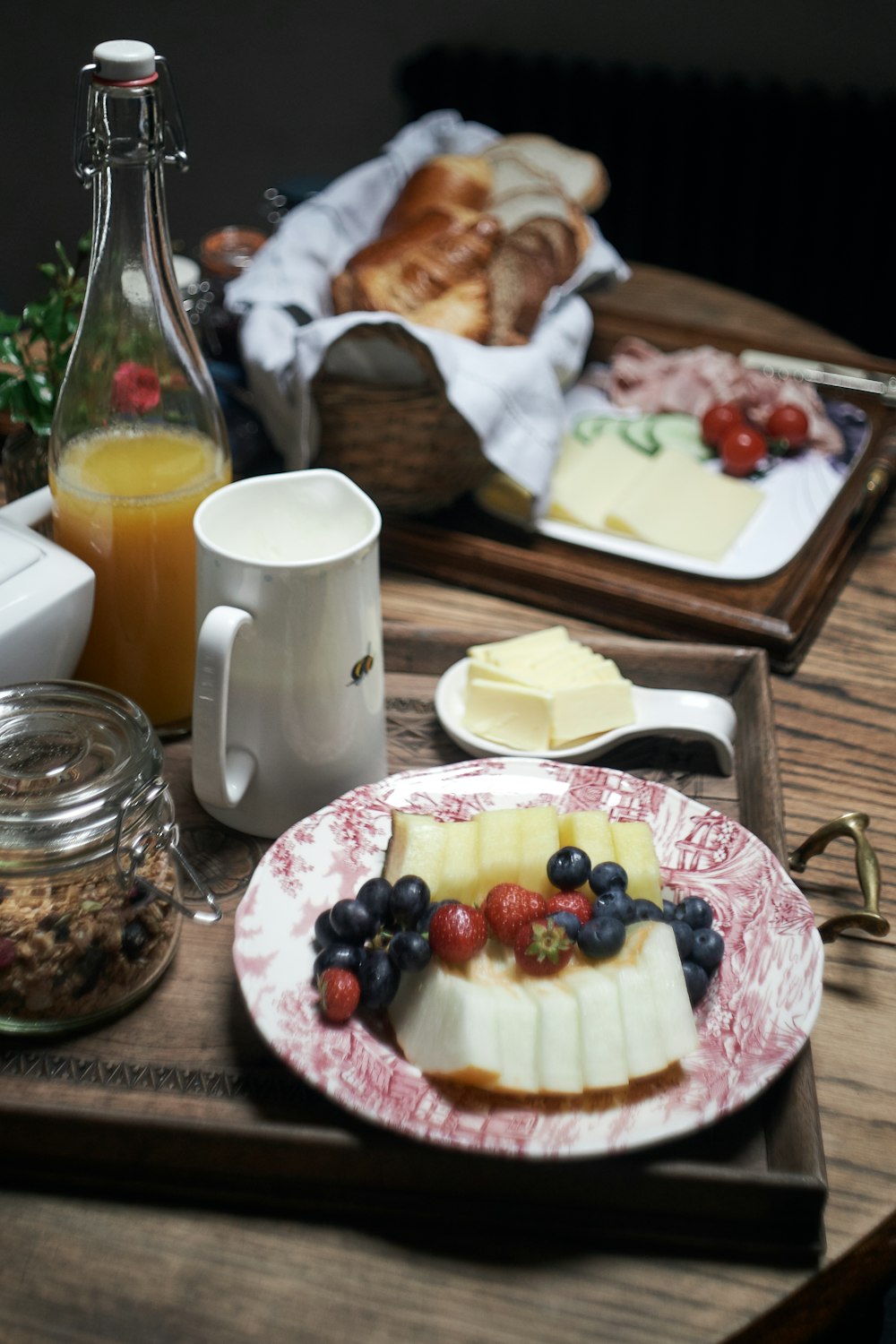 sliced cake on white ceramic plate beside white ceramic mug