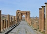 brown concrete arch under blue sky during daytime