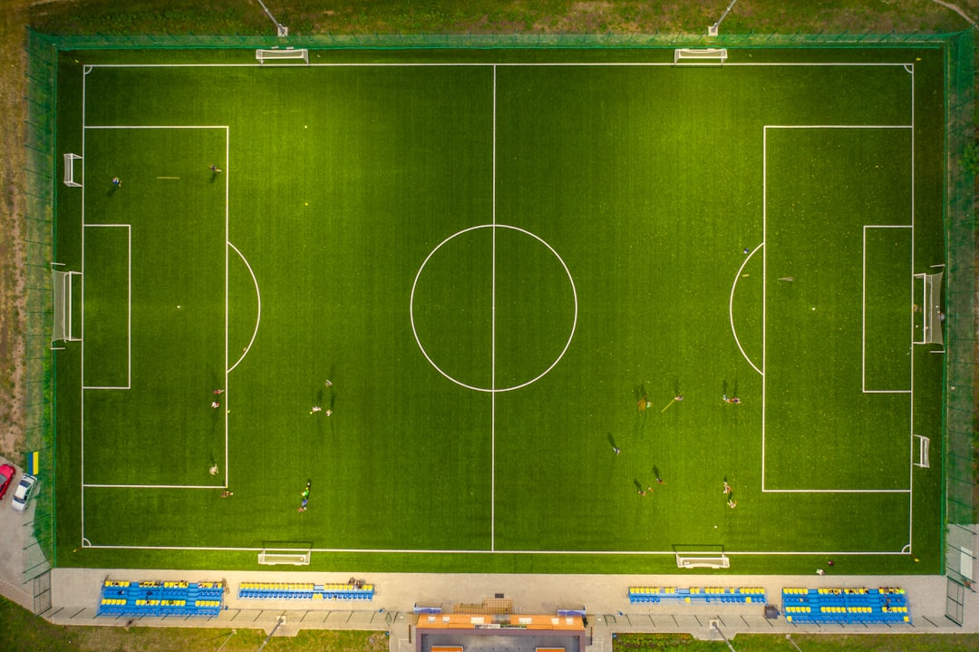 green and brown football field