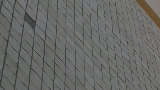 Close-up of elegant porcelain tiles arranged in a modern living room setting