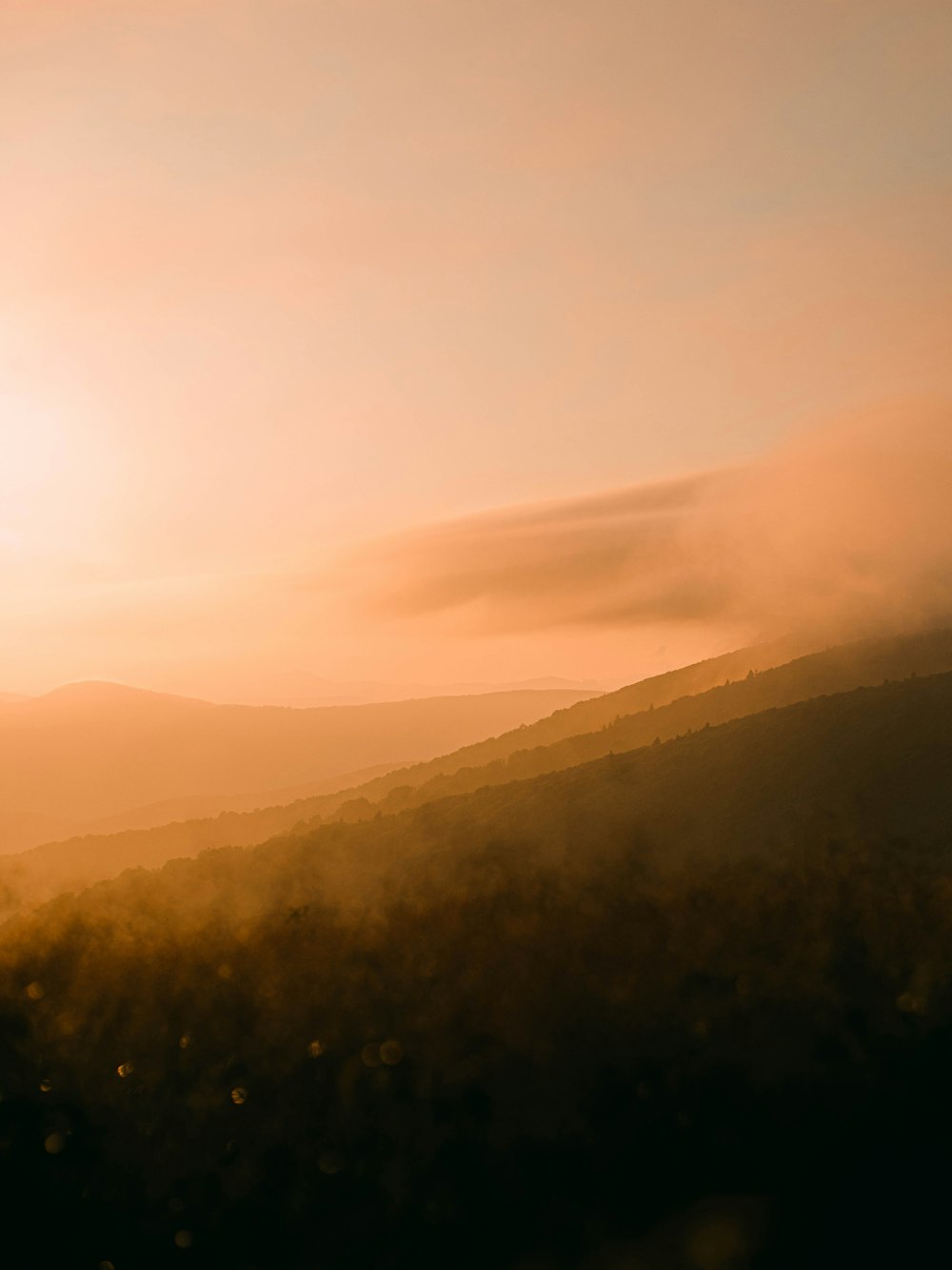 silhouette of mountain during sunset