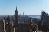 A panoramic view of a city skyline featuring towers.