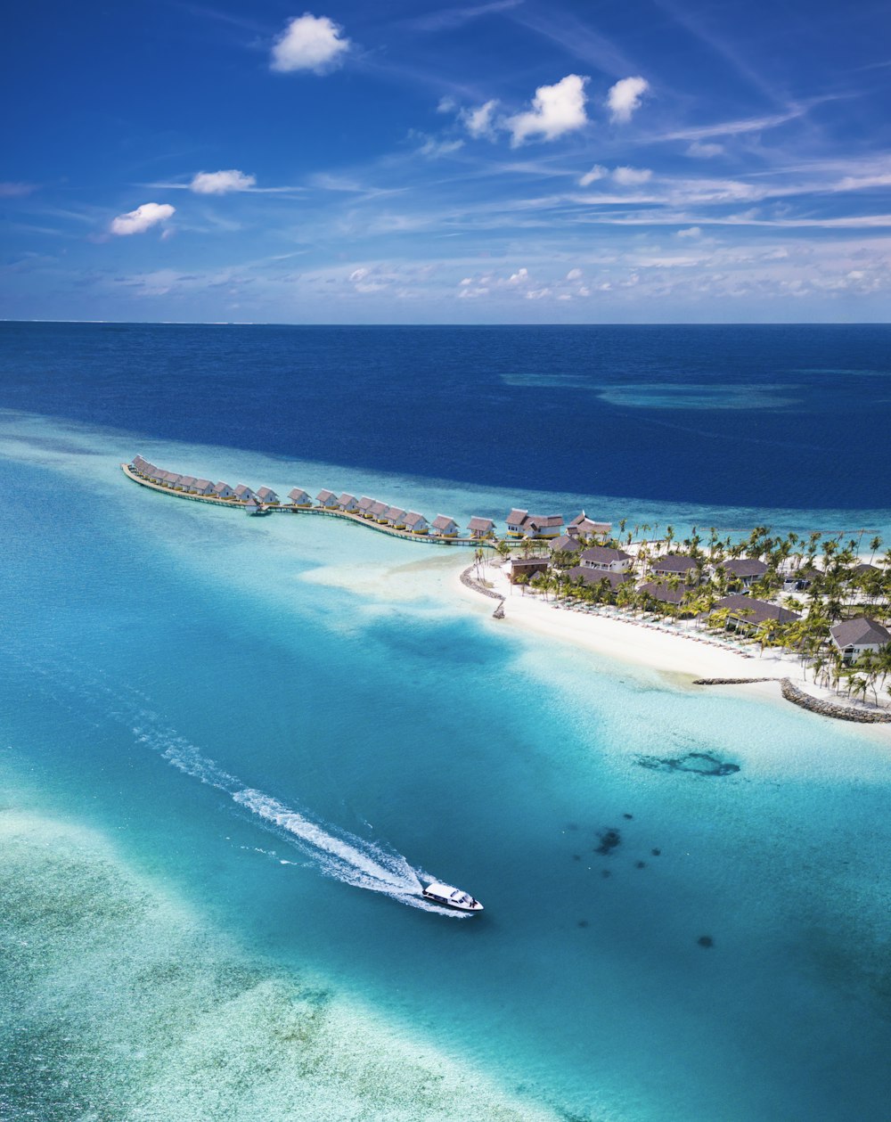 aerial view of white boat on sea during daytime