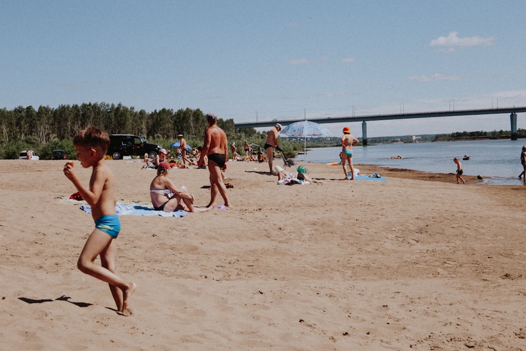 people on beach during daytime