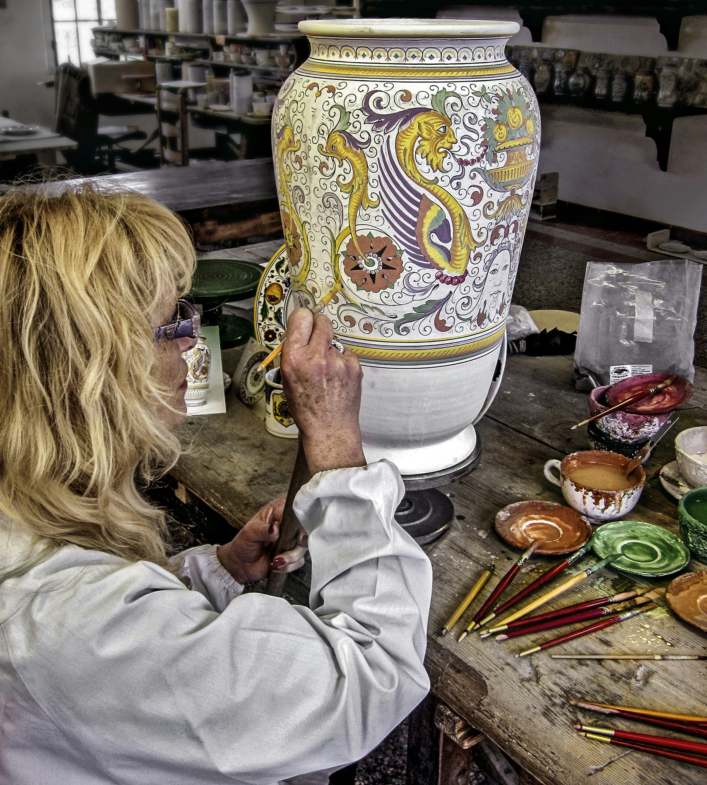 Elegant ceramic vase with hand-painted floral design for home decoration