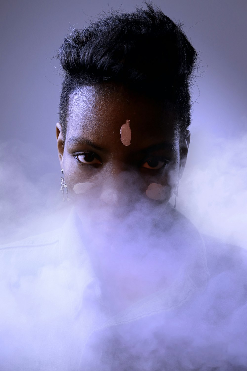 man with white powder on his face