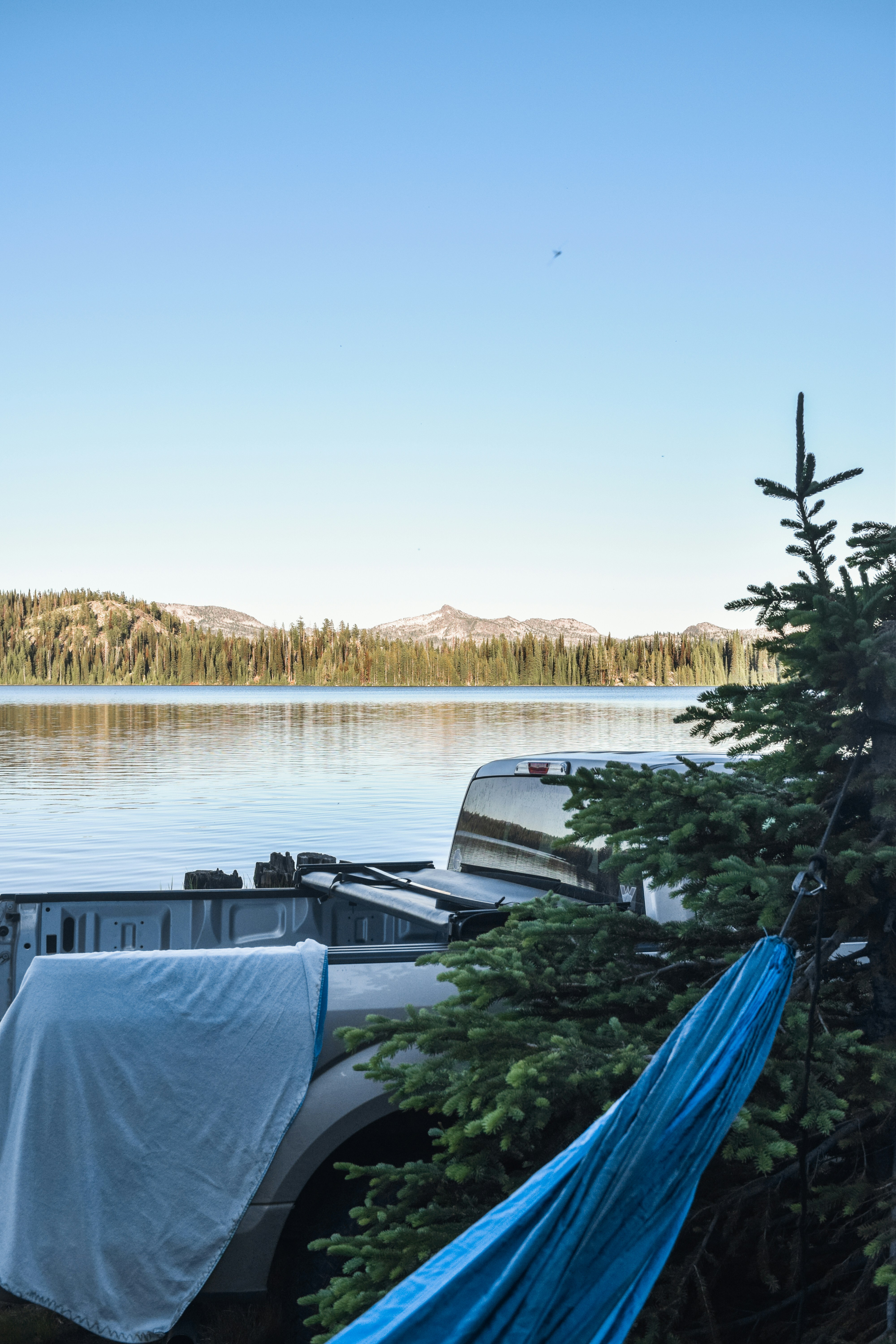 white boat on body of water during daytime