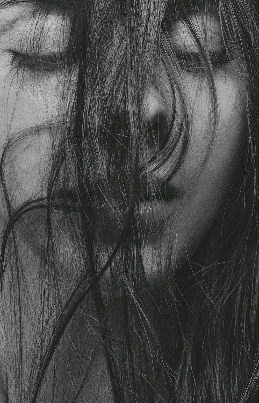 grayscale photo of womans hair