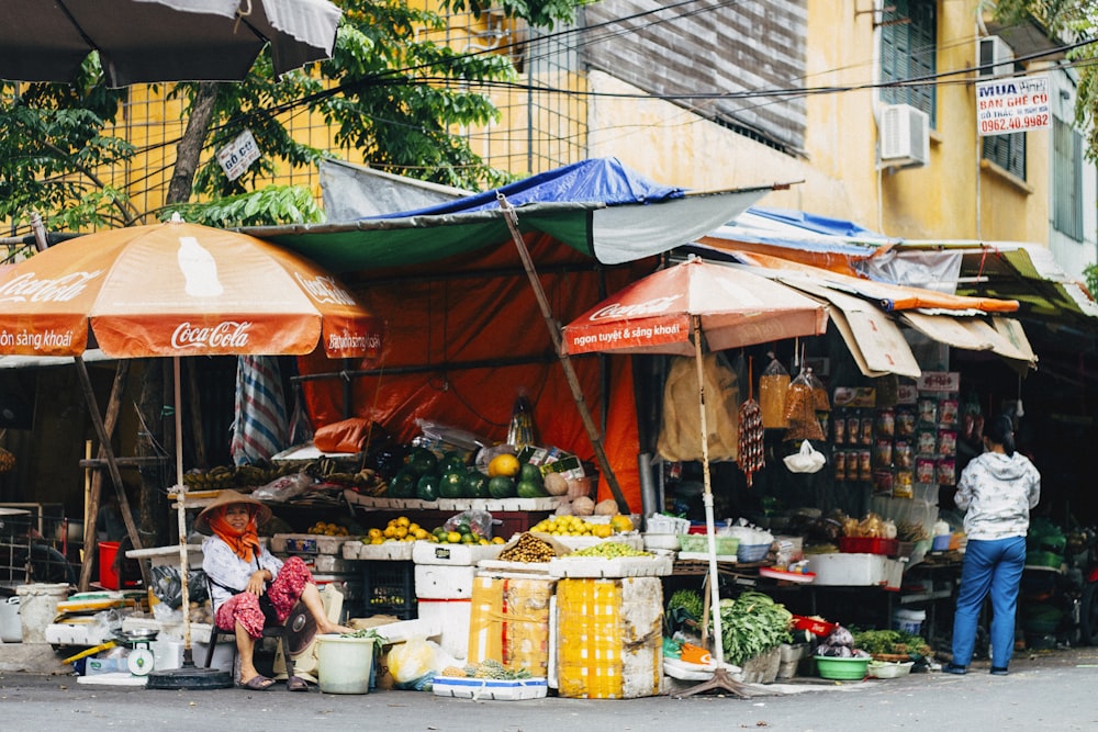 people walking on market during daytime