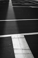 A close-up of a two-car parking area with clear lines.