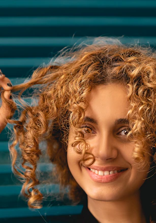 woman with blonde hair smiling