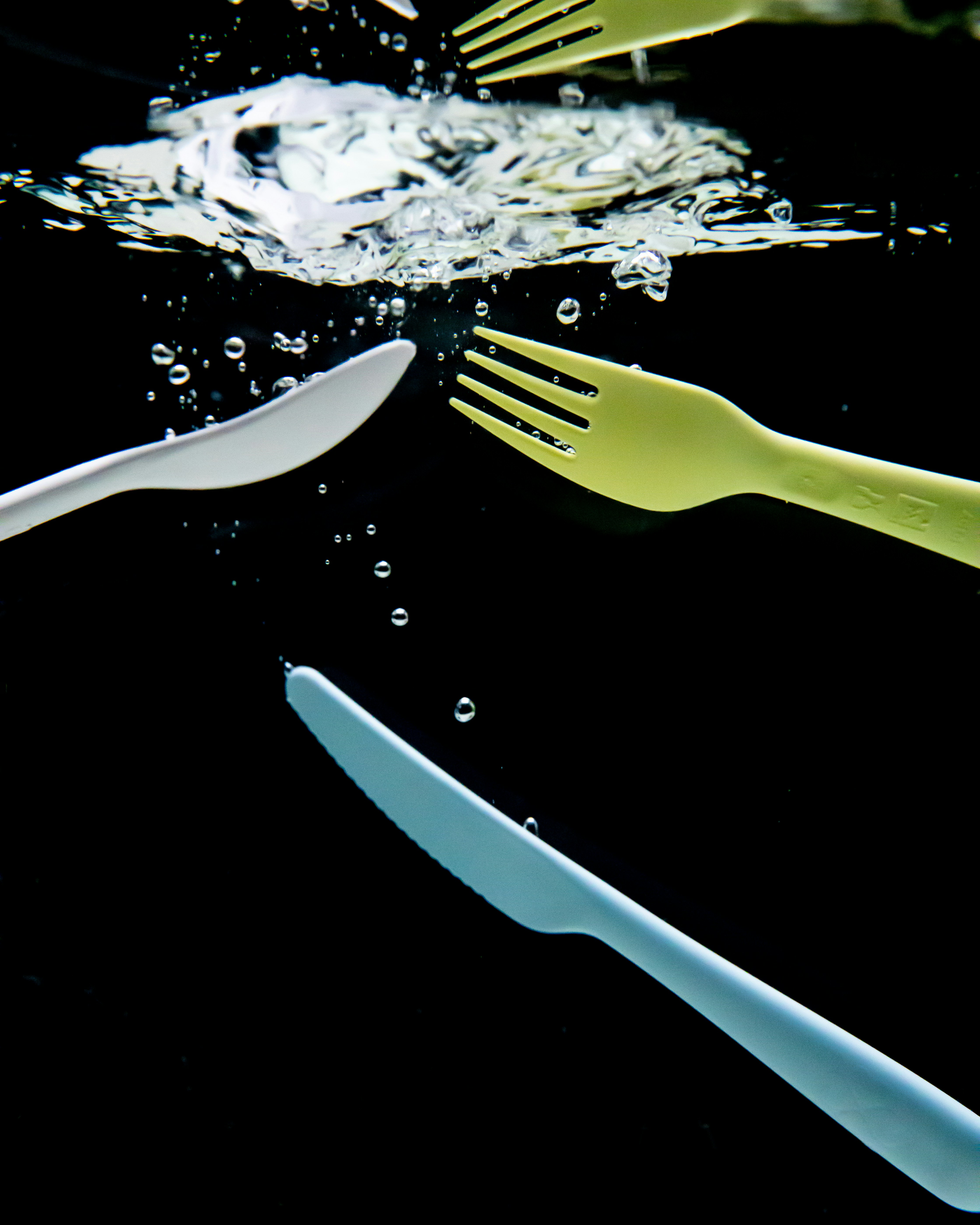 silver fork on white tissue paper