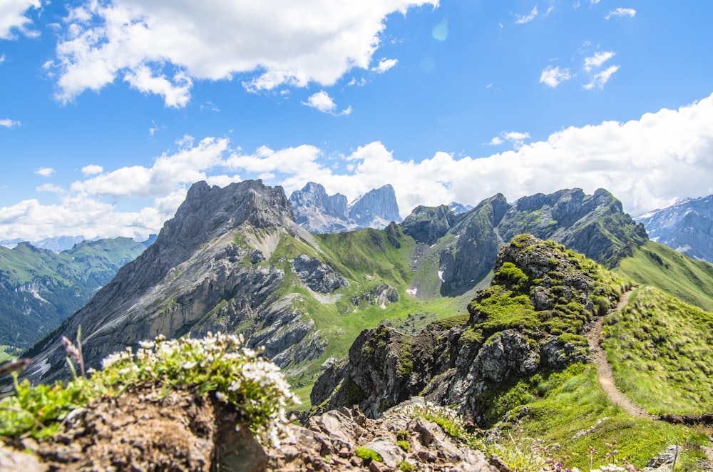 green and gray mountains under blue sky during daytime