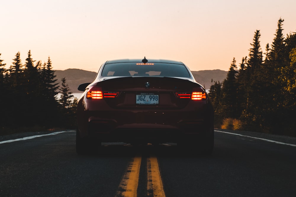 black car on road during daytime