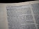 A close-up view of an open Bible, focusing on a section that includes the story of Pharaoh's dreams. The text is printed in two columns with a chapter heading in bold. The page appears to be slightly angled, with the text reading 'Pharaoh's dreams' and detailing a biblical passage.