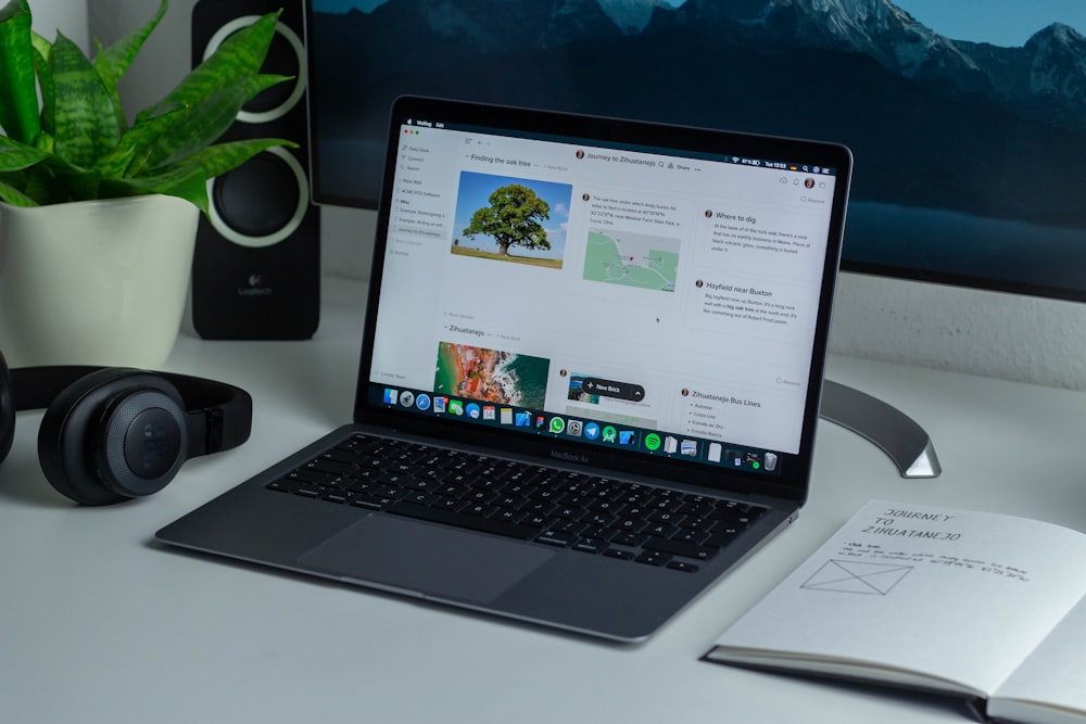 macbook pro on white table