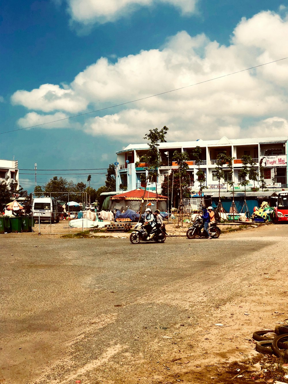 people riding on motorcycle during daytime