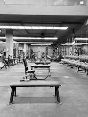 Photo of a spacious gym area with weight machines and dumbbells up to 60kg