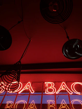 A sleek industrial facility with deep red and charcoal tones reflecting bromine-inspired branding.