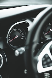 black and silver car speedometer