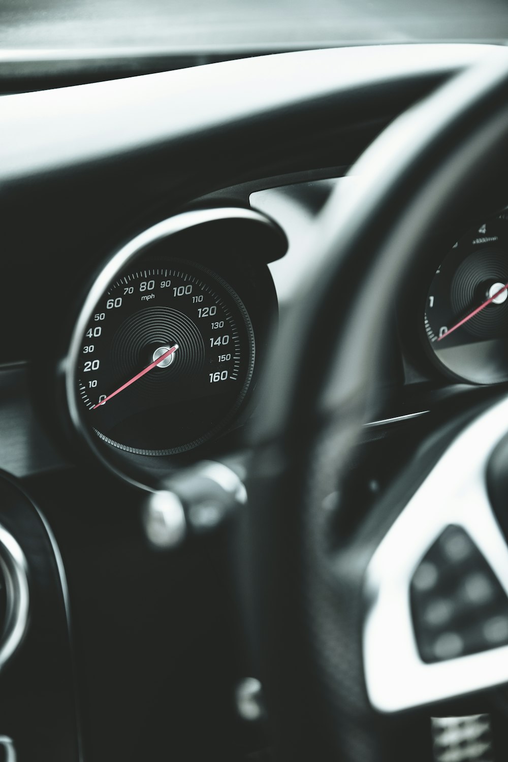 black and silver car speedometer