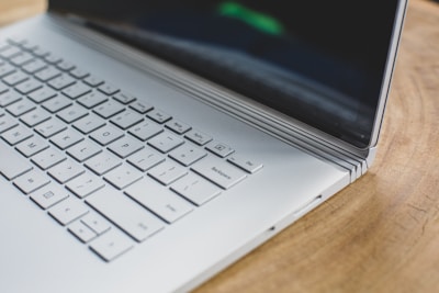 white and black laptop computer