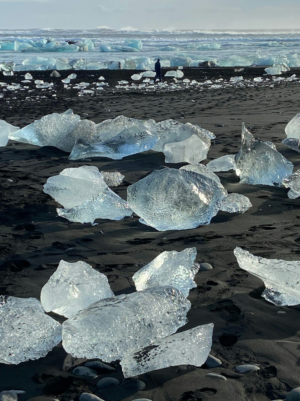 gray rocks on seashore during daytime