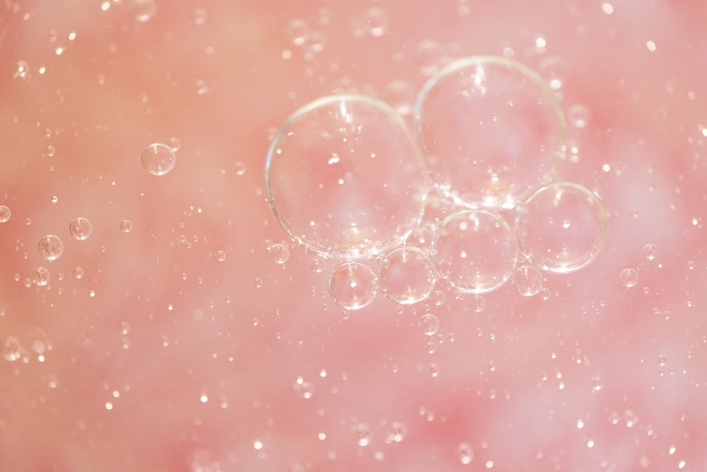 water droplets on red surface