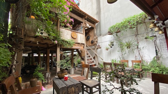 brown wooden table and chairs in Hanoi Vietnam