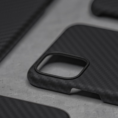A sleek custom 3D printed phone case in matte black finish.