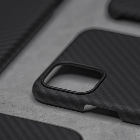 Close-up of a 3D-printed phone holder made with 2. pla+ material, showcasing smooth layers and slight flexibility.