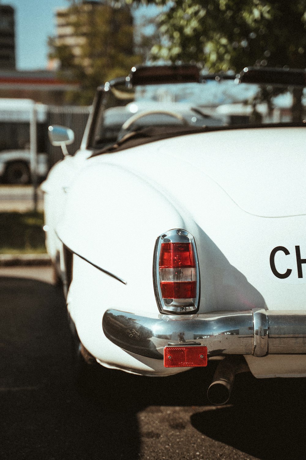 white mercedes benz car on road during daytime