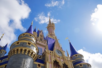 brown and blue concrete castle under blue sky during daytime