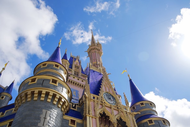 brown and blue concrete castle under blue sky during daytime