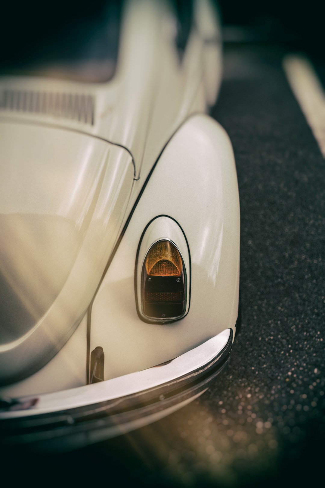 white car on gray asphalt road