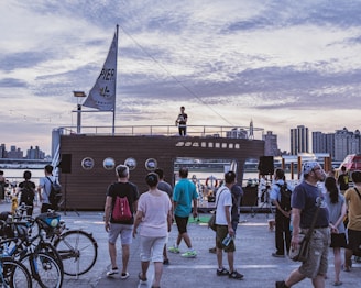 A vibrant scene of the mobile podcast studio set up outdoors with a bicycle and microphones.