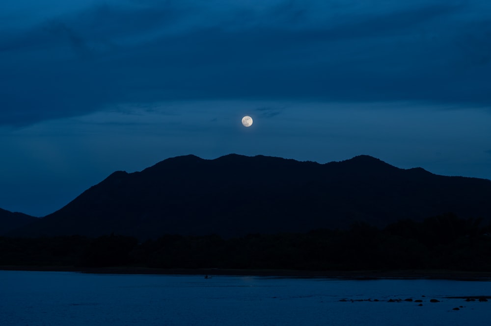 silhouette of mountain during sunset