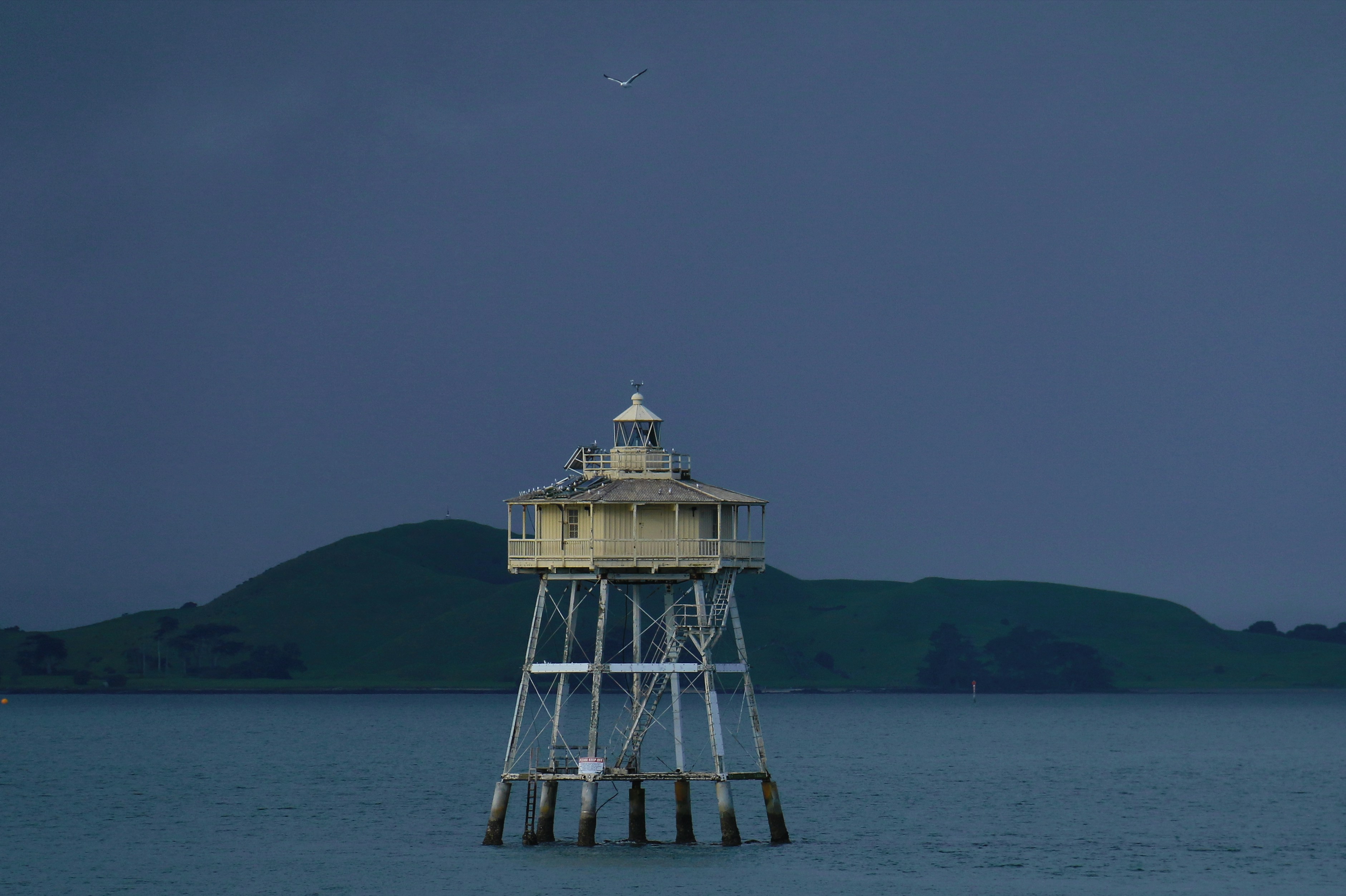 Bean Rock Lighthouse is situated in the Waitemata Harbour in Auckland, New Zealand. It is the only remaining example in New Zealand of a wooden cottage-style lighthouse, and it is one of only a few remaining worldwide.
