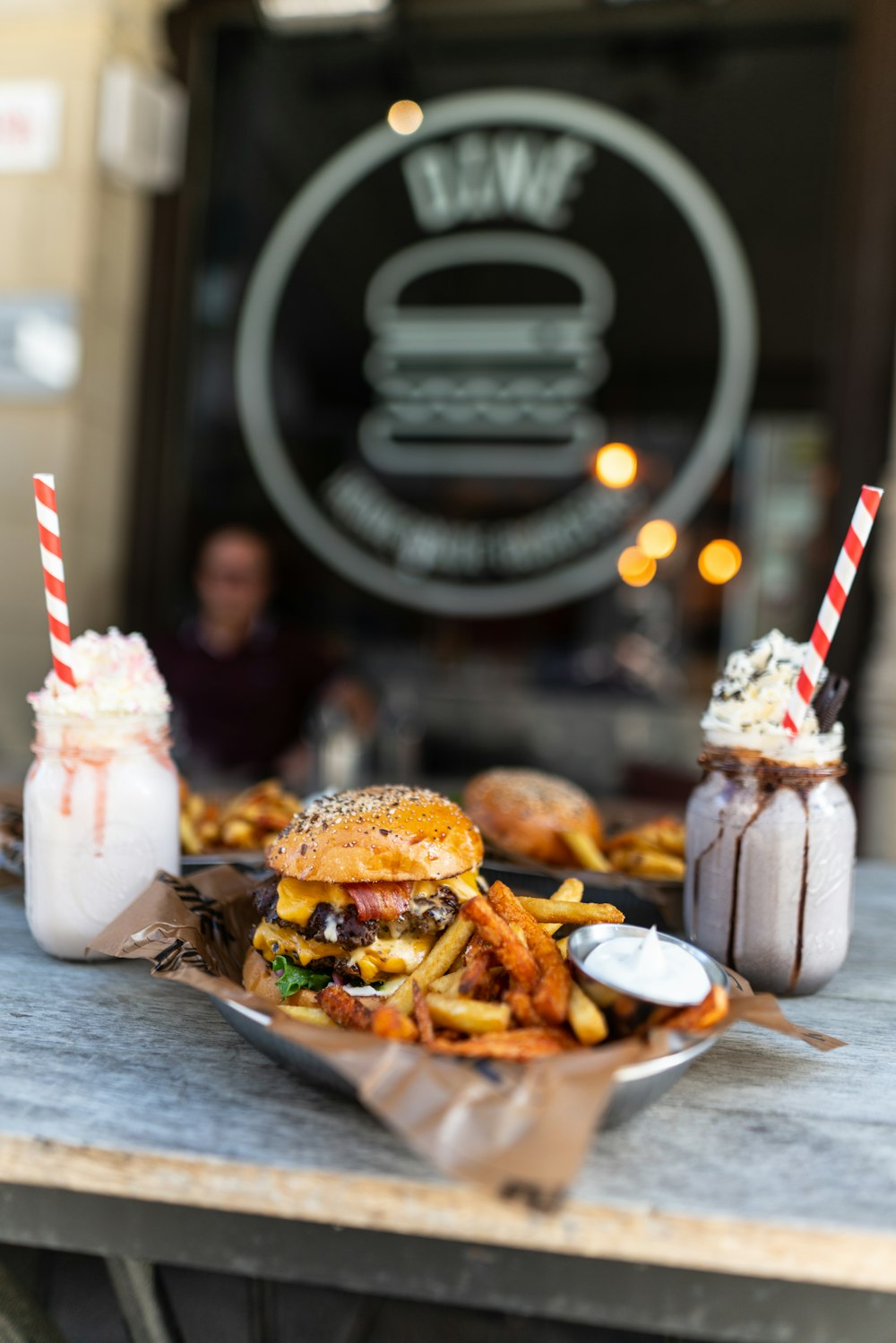 burger with fries on plate