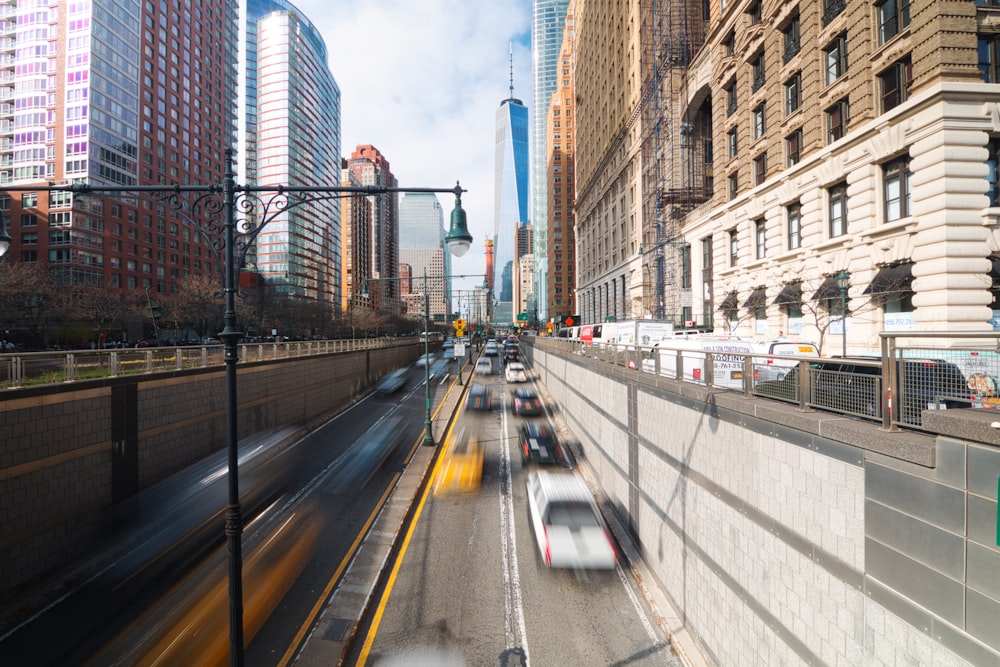 time lapse photography of cars on road during daytime