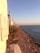 A serene coastal view of the Ligurian Riviera at sunset, showcasing the blend of nature and elegance.