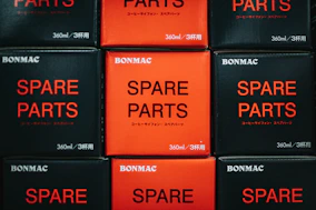 Detailed shot of emergency replacement parts boxed and labeled for quick dispatch.