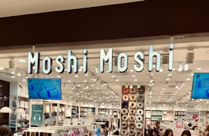 Finished commercial ad displayed on a laptop screen showing Moshi Motion branding