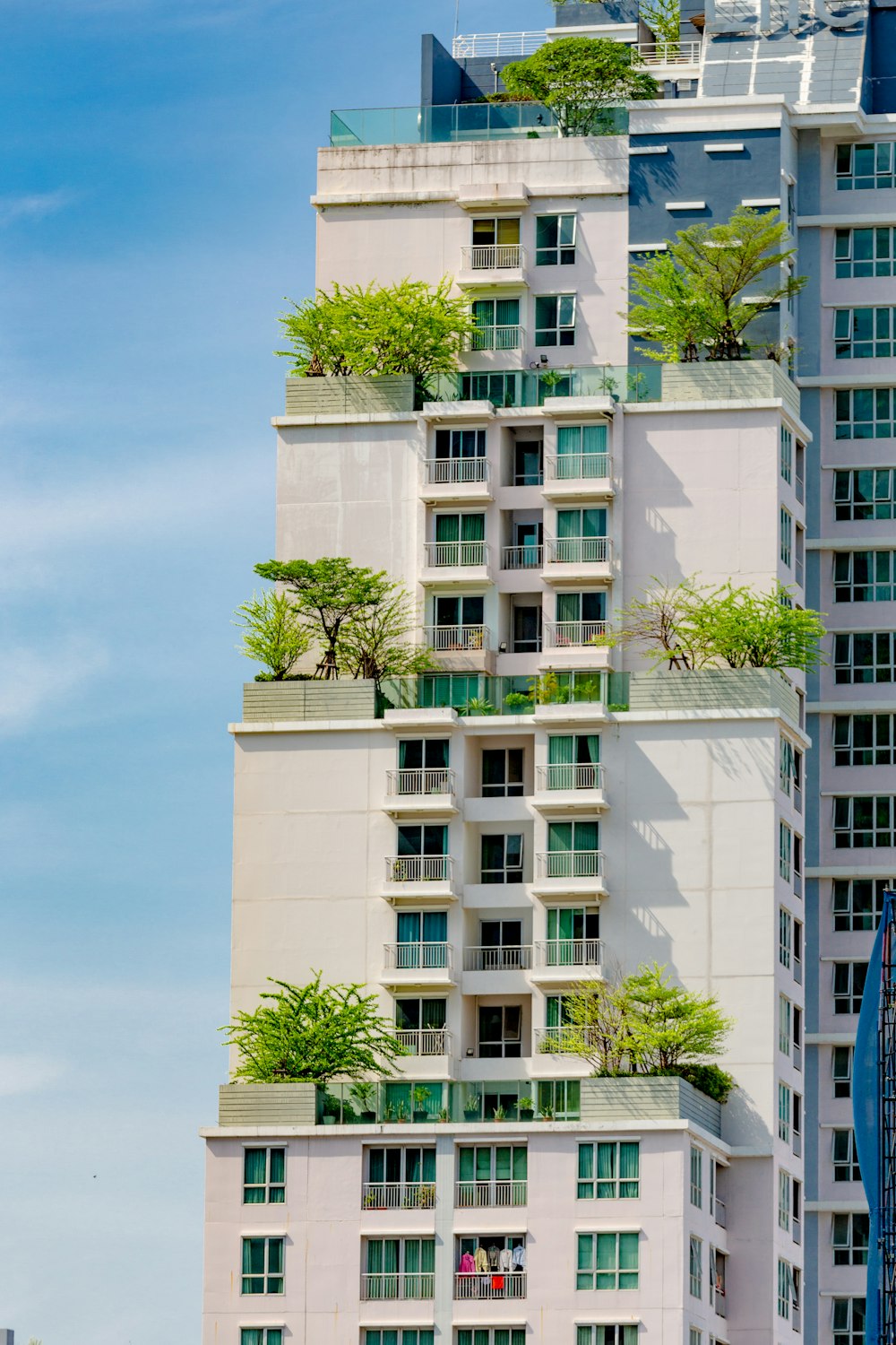 white concrete building under blue sky during daytime